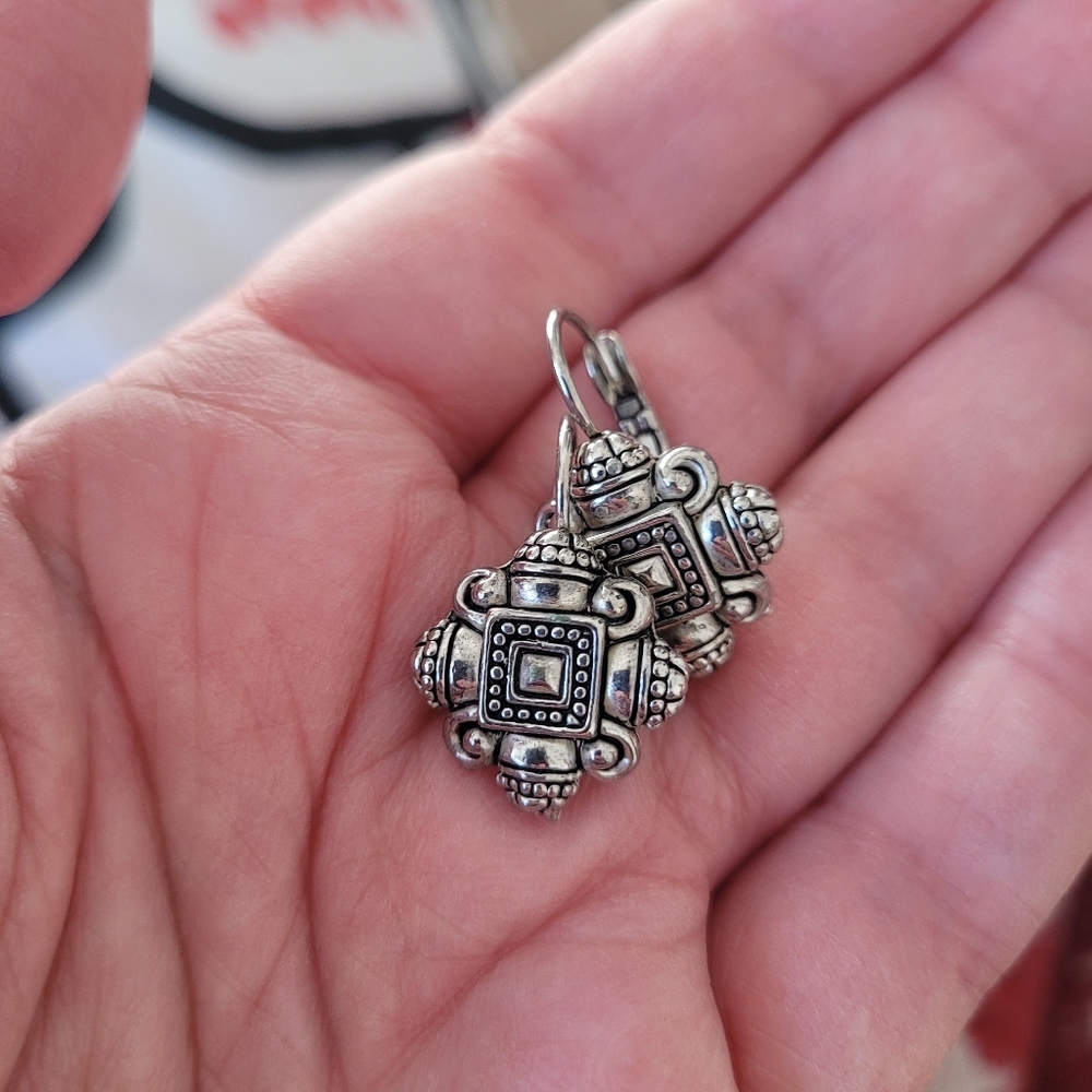 Silver tone tribal earrings
